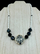 Load image into Gallery viewer, This impressive 24mm reconstituted quartzite lentil bead creates an eye-catching statement piece. The black and white glass beads add a sophisticated touch to its understated tree print. Perfectly suited to casual and formal occasions alike, this stunning necklace will complete any look. It was inspired by the stunning landscapes found in the U.S. National Arboretum in D.C. Measurements: Necklace is 17 " in length