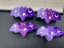 Load image into Gallery viewer, Cute and spooky magnet design to adorn your refrigerator, lockers, workstation, toolbox, or dishwasher. This hand-sculpted clay bat statuette boasts stunning ombre coloration, transitioning from dark purple to light purple to recreate the breathtaking look of a starry night sky. H 1” x W 2” x D 1/2”