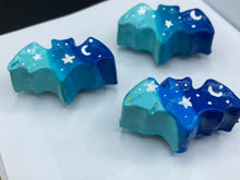 Load image into Gallery viewer, Cute and spooky magnet design to adorn your refrigerator, lockers, workstation, toolbox, or dishwasher. This hand-sculpted clay bat statuette boasts stunning ombre coloration, transitioning from dark blue to light blue to recreate the breathtaking look of a starry night sky. H 1” x W 2” x D 1/2”