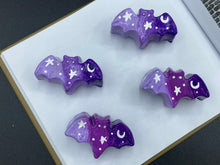 Load image into Gallery viewer, Cute and spooky magnet design to adorn your refrigerator, lockers, workstation, toolbox, or dishwasher. This hand-sculpted clay bat statuette boasts stunning ombre coloration, transitioning from dark purple to light purple to recreate the breathtaking look of a starry night sky. H 1” x W 2” x D 1/2”