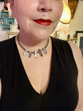 Load image into Gallery viewer, This sophisticated double-strand necklace glitters with silver and gray-tone glass beads, complemented by luminous blue crystal stone nuggets. It gracefully drapes around the neck. Measurements:  Necklace is 15 1/4”adjustable up to 17" in length