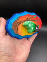 Load image into Gallery viewer, This unique Starry Night Mini Bat Wall Art Decor is hand sculpted and painted in vivid hues to offer an eye-catching decoration for your living space. The bat is painted in a gradient of light green to dark green to black, and is complemented by white stars and a crescent moon. The wood frame is painted in yellow, orange and red for a stunning sundown effect, with a royal blue edge for added contrast.