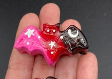 Load image into Gallery viewer, Cute and spooky magnet design to adorn your refrigerator, lockers, workstation, toolbox, or dishwasher. This hand-sculpted clay bat statuette boasts stunning ombre coloration, transitioning from black to dark red to pink to recreate the breathtaking look of a starry night sky. H 1” x W 2” x D 1/2”