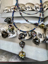 Load image into Gallery viewer, Cascade of Edgy Gun Metal Skulls Glass Beaded Necklace, Pastel Goth Skull Jewelry, Vampire Goth, Dia De Los Muertos Calavera