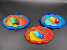 Load image into Gallery viewer, Starry Night Mini Bat Wall Art Decor. A perfect hanging art piece to add a pop of color to your wall, next to your display of crystals or witchy altar. Bat figurine is made of polymer clay, painted ombre colors from light yellow, to orange, then to dark red with white stars and crescent moon flying over the sun rise sky. Dark blue wood frame matches the light blue sky. Art come ready to hang with a sawtooth hangers on back. Measurements: H 3" x W 5” x D 1 1/2"