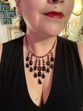 Load image into Gallery viewer, This Vampire Goth style choker necklace features a mix of black and red glass beads with a hanging large tear drop black bead that gives it a depth and complexity of color. Perfect for formal dresses as it gracefully drapes down the neck. Necklace is 15” adjustable to 18"