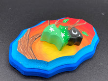 Load image into Gallery viewer, This unique Starry Night Mini Bat Wall Art Decor is hand sculpted and painted in vivid hues to offer an eye-catching decoration for your living space. The bat is painted in a gradient of light green to dark green to black, and is complemented by white stars and a crescent moon. The wood frame is painted in yellow, orange and red for a stunning sundown effect, with a royal blue edge for added contrast.