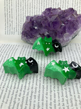Load image into Gallery viewer, Cute and spooky magnet design to adorn your refrigerator, lockers, workstation, toolbox, or dishwasher. This hand-sculpted clay bat statuette boasts stunning ombre coloration, transitioning from black to dark green to light green to recreate the breathtaking look of a starry night sky. H 1” x W 2” x D 1/2”