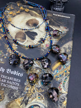 Load image into Gallery viewer, Cascade of Edgy Gun Metal Skulls Glass Beaded Necklace, Pastel Goth Skull Jewelry, Vampire Goth, Dia De Los Muertos Calavera