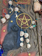 Load image into Gallery viewer, Dangling Skulls With Crosses Earrings, Pastel Goth Skulls And Crosses Jewelry, Dia De Los Muertos Aretes, Day of the Dead Jewelry, Fish Hook