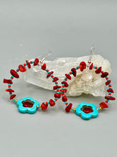 Load image into Gallery viewer, These Bamboo coral red stone chip earrings feature a subtle hoop design adorned with tiny turquoise, red, and gold glass beads. Completing the look is a turquoise flower pendant with a dark red glass bead in the center. Measurements: 2" length