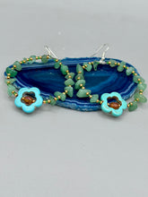 Load image into Gallery viewer, Achieve a simple nature look with these aventurine natural stone chip beaded hoop earrings. The green and gold glass beads and turquoise flower pendant with amber-tone glass beads add a bohemian-chic touch to any ensemble. These earrings are perfect for any free-spirited occasion. Measurements: 2 1/4" length