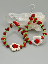 Load image into Gallery viewer, These bamboo coral red stone chip beaded hoop earrings feature green and gold glass, while a white magnesite flower pendant and quartzite rose beads add detail. Measurements: 3" length