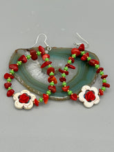 Load image into Gallery viewer, These bamboo coral red stone chip beaded hoop earrings feature green and gold glass, while a white magnesite flower pendant and quartzite rose beads add detail. Measurements: 3" length