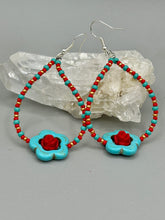 Load image into Gallery viewer, These gorgeous turquoise magnesite floral beaded earrings exude a hippie-style and shabby-chic vibe. The beautiful turquoise magnesite beads are decorated with quartzite rose beads and red, turquoise, and gold glass beads, giving a unique and nature-inspired look that is perfect for Bohemian fashion. Measurements: 2 1/2" length