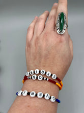 Load image into Gallery viewer, Rainbow Pride beaded bracelet ON STRIKE Metal wire with hook-eye clasp.