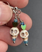 Load image into Gallery viewer, Howlite Skull Beads Earrings With Tiny Star Heat Shaped Rainbow Hematite Bead. Versatile style, pastel goth, celestial stardust, witchy, day of the dead. You can dress these up or down, it will definitely give your outfit a unique look. Measurements: 1 ” in length