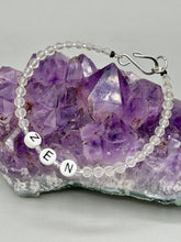 Load image into Gallery viewer, Hand beaded bracelet with clear and silver glass beads, Zen letters Metal wire with hook-eye clasp.