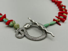 Load image into Gallery viewer, This uniquely designed Southwestern Style necklace is a mesmerizing blend of large bamboo red coral beads as well as turquoise and gold glass beads. The finishing touch is a beautiful large serpent toggle clasp. Measurements: Necklace is 25 1/2 " in length