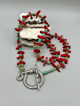 Load image into Gallery viewer, This uniquely designed Southwestern Style necklace is a mesmerizing blend of large bamboo red coral beads as well as turquoise and gold glass beads. The finishing touch is a beautiful large serpent toggle clasp. Measurements: Necklace is 25 1/2 " in length