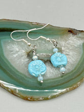 Load image into Gallery viewer, These light blue pressed glass floral beaded earrings feature a fish hook-style closure for a secure fit. Earrings: 1 1/4" length