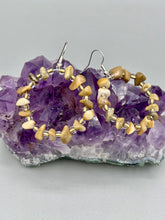 Load image into Gallery viewer, These lightweight Natural Bamboo Chip Beaded Hoop Earrings are perfect for any boho chic look. The combination of neutral colors and nature inspired design makes them the perfect accessory for any outfit. The glass beads add a subtle sparkle to complete the hippie vibe. Measurements: 1 1/2" length