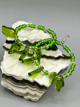 Load image into Gallery viewer, Light green glass leaf beaded earrings are intricately designed, making them ideal for styling in all seasons. Measurements: Earrings: 2 1/4" length