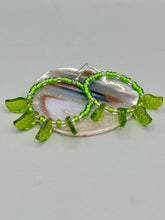 Load image into Gallery viewer, Light green glass leaf beaded earrings are intricately designed, making them ideal for styling in all seasons. Measurements: Earrings: 2 1/4" length