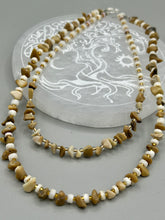 Load image into Gallery viewer, This natural bamboo, bone, and gold glass beaded necklace is the perfect piece to add versatility to any outfit. The neutral colors blend easily with any look and will give your outfit an unforgettable look. Measurements: Necklace: 15" - can be adjusted up to 16"