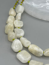 Load image into Gallery viewer, This exquisite necklace features large natural Calcite beads complemented by Wasabi Green glass beads. Two strands of neutral colors bring a sophisticated look that can dress up or dress down any outfit for a one-of-a-kind style. Measurements: Necklace is 17 1/4 " in length adjustable to 18 1/2"