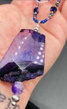 Load image into Gallery viewer, For The Love Of Nature - Vibrant Purple Agate Nature Stone With Two Strands of Multi-Color Glass Beaded Necklace. Large agate stone is full of purple hues from sheer, to vibrant violet, to deep dark purples. This beautiful agate necklace is the perfect summer necklace. Measurements: Necklace is 15 1/2” adjustable up to 18" in length - pendant is 2 1/2” Height
