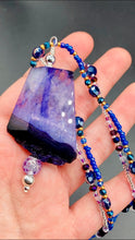 Load image into Gallery viewer, For The Love Of Nature - Vibrant Purple Agate Nature Stone With Two Strands of Multi-Color Glass Beaded Necklace. Large agate stone is full of purple hues from sheer, to vibrant violet, to deep dark purples. This beautiful agate necklace is the perfect summer necklace. Measurements: Necklace is 15 1/2” adjustable up to 18" in length - pendant is 2 1/2” Height