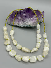Load image into Gallery viewer, This exquisite necklace features large natural Calcite beads complemented by Wasabi Green glass beads. Two strands of neutral colors bring a sophisticated look that can dress up or dress down any outfit for a one-of-a-kind style. Measurements: Necklace is 17 1/4 " in length adjustable to 18 1/2"