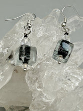 Load image into Gallery viewer, This striking set of earrings features large square-shaped clear glass beads adorned with black-and-white designs. Neutral-hued stone beads lend a cool feel, making them both unique and versatile. Measurements: 1 1/4” in length
