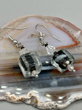 Load image into Gallery viewer, This striking set of earrings features large square-shaped clear glass beads adorned with black-and-white designs. Neutral-hued stone beads lend a cool feel, making them both unique and versatile. Measurements: 1 1/4” in length