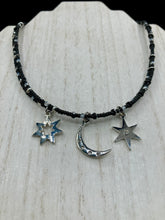 Load image into Gallery viewer, Whimsical Celestial Crescent Moon And Stars Collar Stye Adjustable Glass Beaded Necklace. Two strands are held together with double-hole black and silver beads to keep a collar shape. This necklace beautifully drapes across your neck, a fierce, bold and elegant piece of jewelry. Perfect for Goth, Witchy, and Stardust Celestial Styles.  Measurements:    Necklace is 15” in length (“collar” style), can be adjusted up to 18"