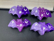 Load image into Gallery viewer, Cute and spooky magnet design to adorn your refrigerator, lockers, workstation, toolbox, or dishwasher. This hand-sculpted clay bat statuette boasts stunning ombre coloration, transitioning from dark purple to light purple to recreate the breathtaking look of a starry night sky. H 1” x W 2” x D 1/2”