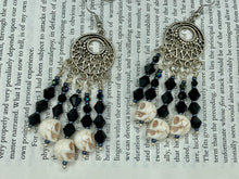 Load image into Gallery viewer, These Gothic Skulls Black Glass Beaded Earrings are a chic fashion statement that can enhance any look. Show off your inner Chingona, Cabrona, Latina Chicana, Goth, Vampire Goth, Dark Witchy, La Bruja Style with a cascade of shimmery skulls. Both formal and informal occasions can be elevated with these stylish earrings.  Measurements: 2 3/4 ” in length