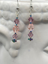 Load image into Gallery viewer, These dainty glass beaded earrings in soft pink and purple, featuring rainbow hematite beads, are perfect for summer ensembles and boho chic looks. An ideal accessory for nature lovers, these earrings will enhance any style. Measurements: 1 1/2” in length