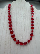 Load image into Gallery viewer, This ruby red heart-shaped glass beaded necklace features a shimmery, translucent finish and a lobster claw clasp. Measurements: Necklace is 18 1/2" in length