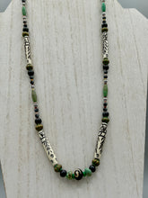 Load image into Gallery viewer, This exquisite necklace features natural ruby zoisite, snowflake obsidian, turquoise magnesite, bone, glass and metal beads, offering a variety of sizes, shapes, textures, and colors.