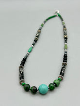 Load image into Gallery viewer, This necklace boasts a diverse selection of natural bead materials, including ruby zoisite, black and snowflake obsidian stones, plus turquoise magnesite, bone, glass and metal beads. This variety of sizes, shapes, textures and colors will make this necklace stand out. Measurements: Necklace - 23" in length