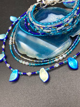 Load image into Gallery viewer, This Ocean Blue Waves Nine Stands Glass Beaded Chunky Wide Bracelet is the ideal accessory for any summer seaside look. Measurements: 8" in length