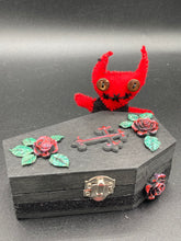 Load image into Gallery viewer, Red Devil Voodoo Doll stands at 4" in height. He has a black torso and red arms and legs and a red head with horns of course. He also has a black sewed shut mouth, Oh my, and brown button eyes.