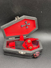 Load image into Gallery viewer, Red Devil Voodoo Doll stands at 4" in height. He has a black torso and red arms and legs and a red head with horns of course. He also has a black sewed shut mouth, Oh my, and brown button eyes.