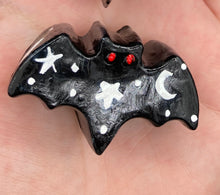 Load image into Gallery viewer, Cute and spooky magnet design to adorn your refrigerator, lockers, workstation, toolbox, or dishwasher. This hand-sculpted clay all black bat statuette has white crescent moon and stars to recreate a starry night sky. H 1” x W 2” x D 1/2”