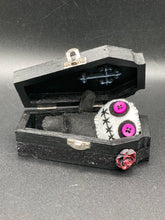Load image into Gallery viewer, Creepy black and purple Voodoo Doll stands tall at 3 3/8" in height. He’s all black like a shadow but has a round white head. Bright purple buttons for eyes are perfect to see you better with.