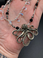 Load image into Gallery viewer, This Steampunk Metal Octopus Double Strand Bead Adjustable Necklace is a stylish and unique addition to any collection. Crafted with vivid iridescent teardrop and glass beads, this stylish jewelry also features a highly detailed metal octopus pendant. Strands of beads are designed to interweave without tangling for a truly eye-catching look. Measurements: Necklace measures 16 1/2” adjustable up to 18”