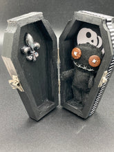 Load image into Gallery viewer, All black Voodoo Doll stands at 3" in height. Like a creepy all black shadow, he has brown buttons for eyes to better to see you with.