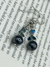 Load image into Gallery viewer, These stunning hematite and glass beaded earrings are a perfect combination of shabby boho chic and bohemian style. The round hematite beads are beautifully complemented by the light blue triangle shaped glass beads, for an eye-catching accessory that is sure to draw attention.  Measurements: 1 1/4” in length